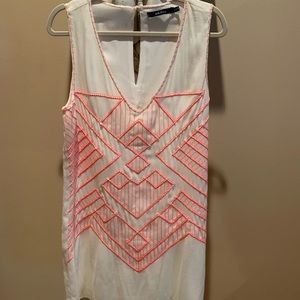 Small White Dress with Pink Detailing